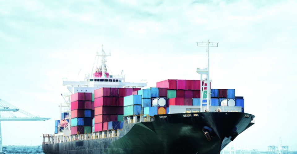 Logistics import export background of Container Cargo ship in seaport on blue sky, Freight Transportation